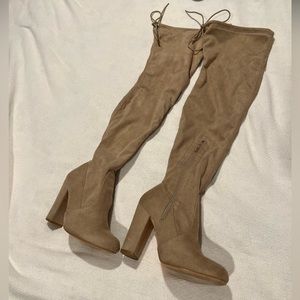 Thigh high lace up boots